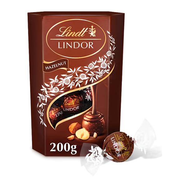 Lindt Lindor Mléčná čokoláda s jemnou krémovou náplní s kousky ořechů